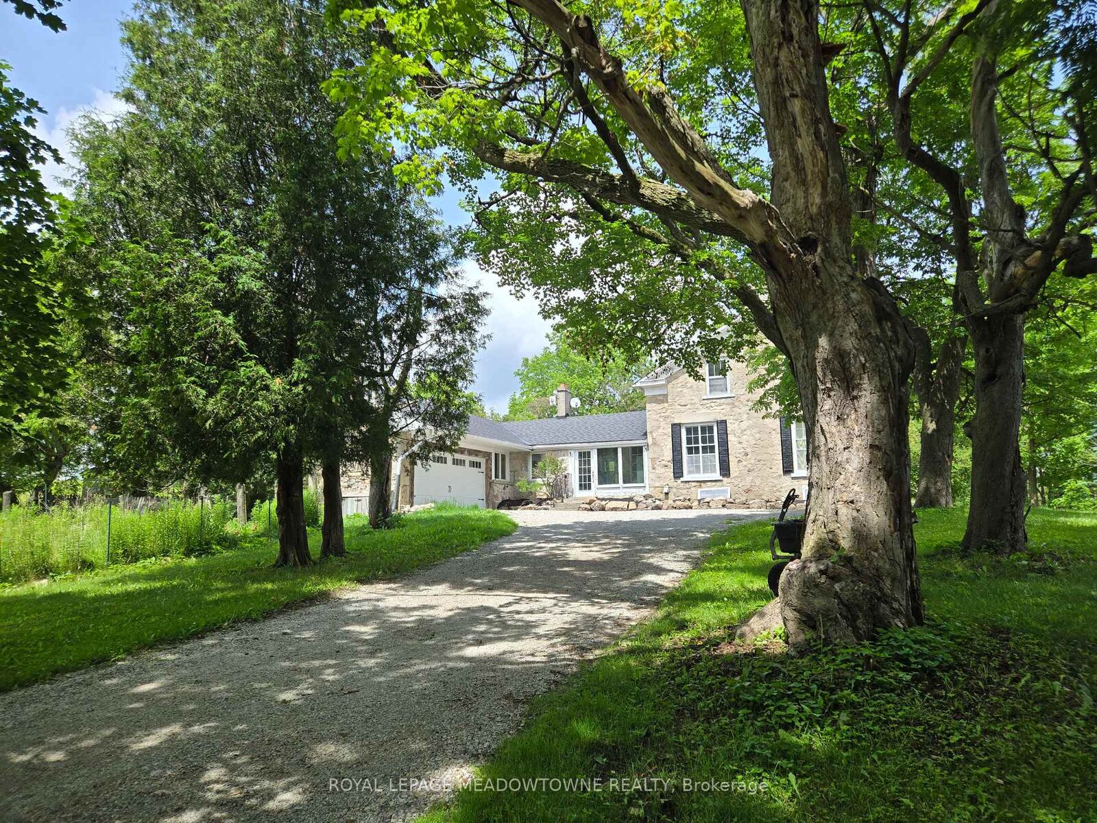 Property Photo: 5595 25 Side Road ON L7J 2L7