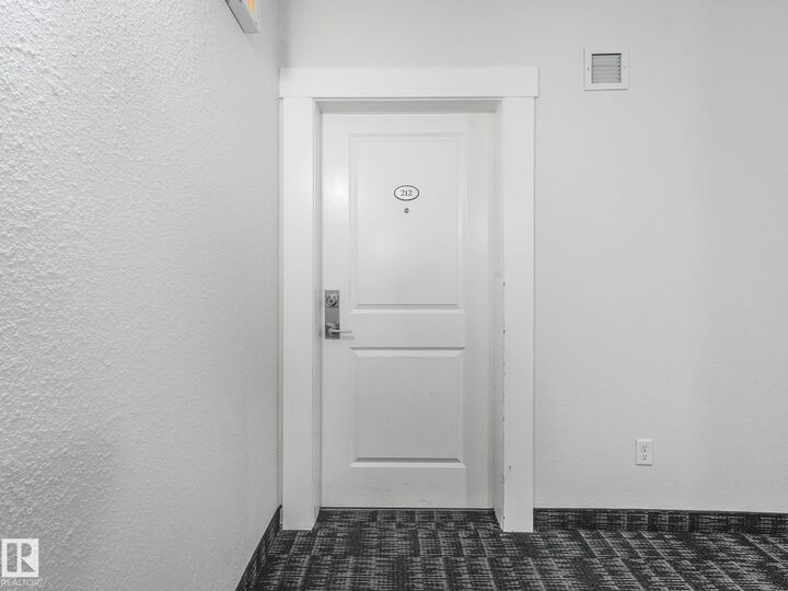 Property Photo: 508 Albany Way NW 212 AB T6V 0L1