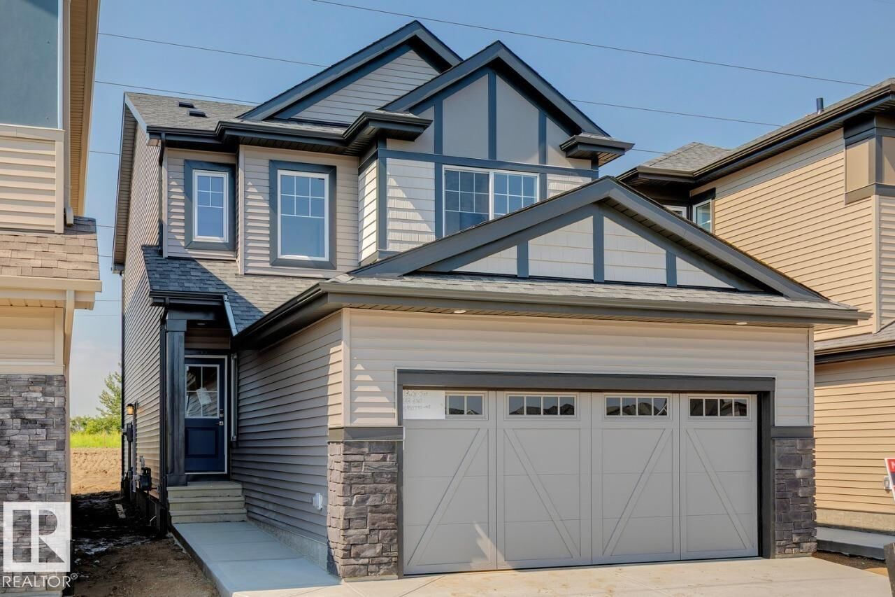 Property Photo: 17328 5 Street NW AB T5Y 6G4