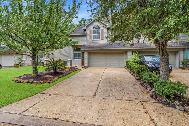 Property Photo: 103 Ledgestone Place TX 77382