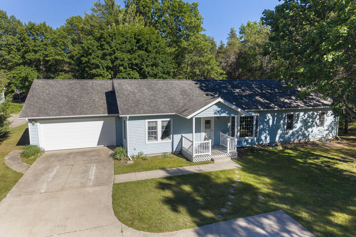 Property Photo:  2721 Red Apple Road  MI 49660 
