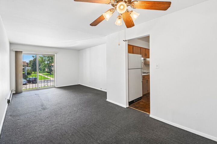 Property Photo: 8997 Kennedy Drive 2E IL 60016