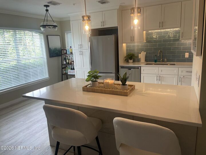 Property Photo:  1701 The Greens Way 2014  FL 32250 