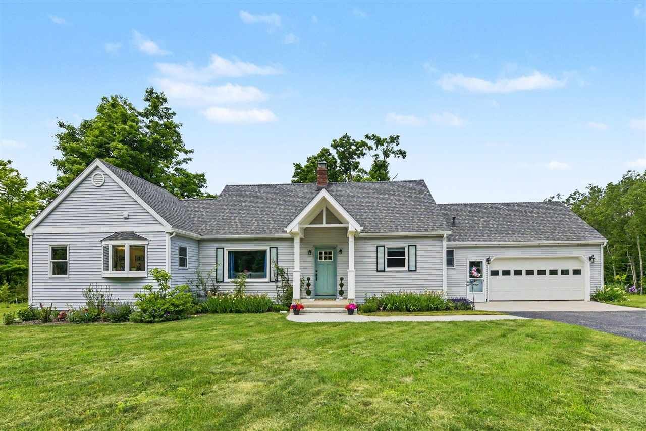 Property Photo:  8205 Major Douglas Sloan  MI 49720 