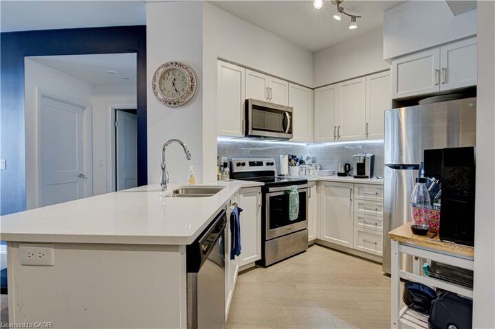 Property Photo: 155 Caroline Street S 1012 ON N2L 0J8