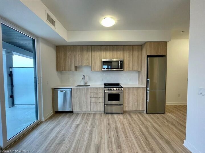 Property Photo:  312 Erb Street W 401  ON N2L 0K9 