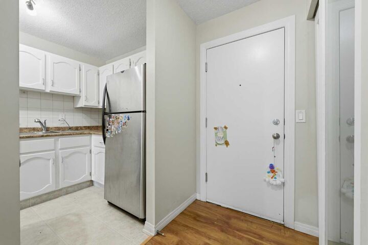 Property Photo:  611 67 Avenue SW 102  AB T2V 0M3 