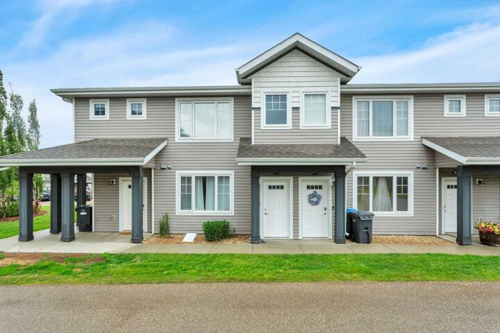 Property Photo: 43 Reid Court 200 AB T4S 0K1