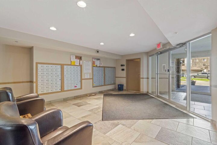 Property Photo:  8 Bridlecrest Drive SW 2431  AB T2Y 0H7 