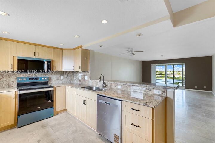 Property Photo:  321 SE 3rd St 408  FL 33004 