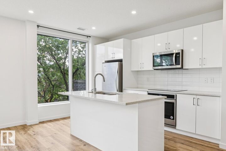 Property Photo:  11503 76 Avenue NW 415  AB T6G 0K6 