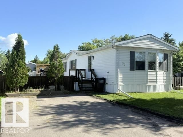 Property Photo: 36 Ridgeway Drive NW AB T6P 1G5