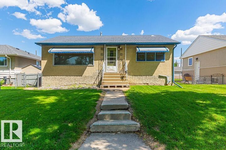 Property Photo:  13031 63 Street NW  AB T5A 0W5 