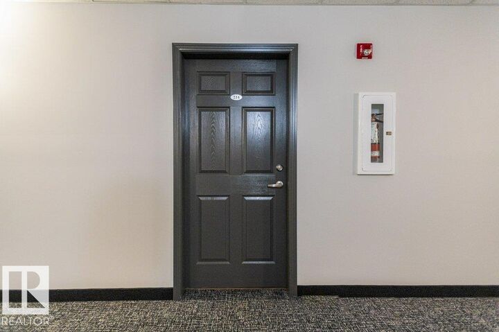 Property Photo:  5005 165 Avenue NW 214  AB T5Y 0L8 