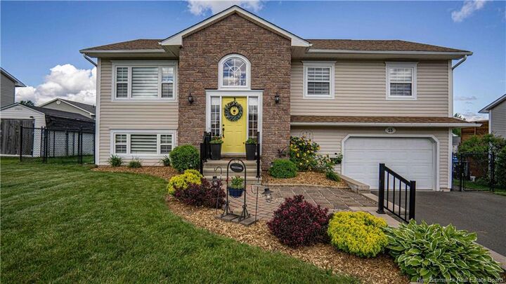 Property Photo:  53 Mockler Street  NB E2V 4R4 