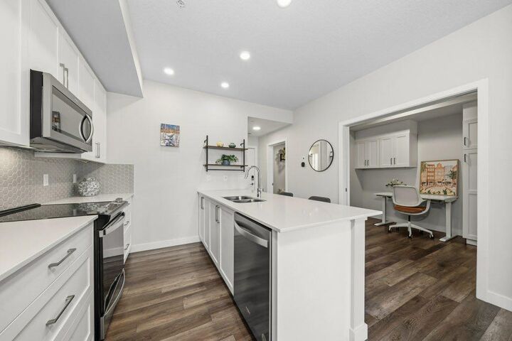 Property Photo:  255 Les Jardins Park SE 224  AB T2C 5W9 