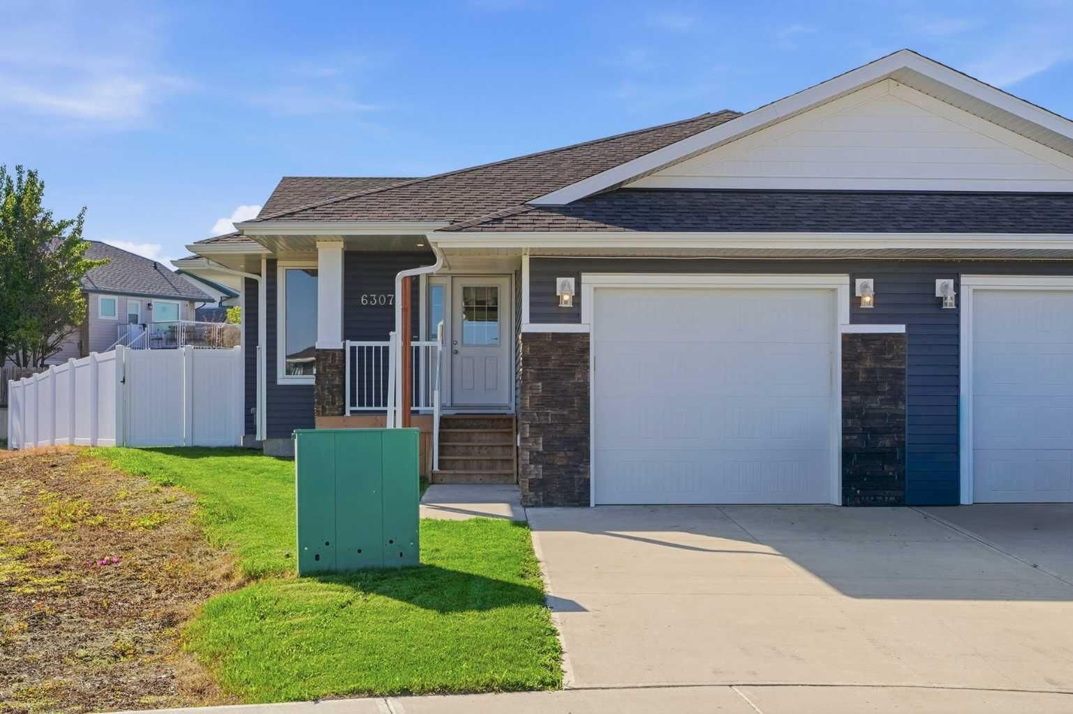 Property Photo: 6307 58 A Street AB T4T 0C2
