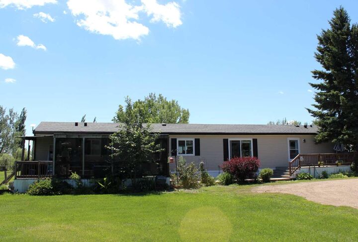 Property Photo:  150030 Hwy 542 Prins Acres 8  AB T1R 1B8 