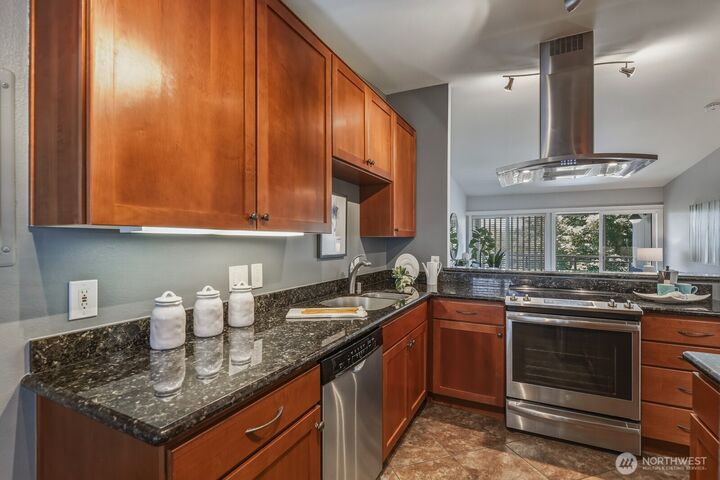 Property Photo:  130  105th Avenue SE 316  WA 98004 