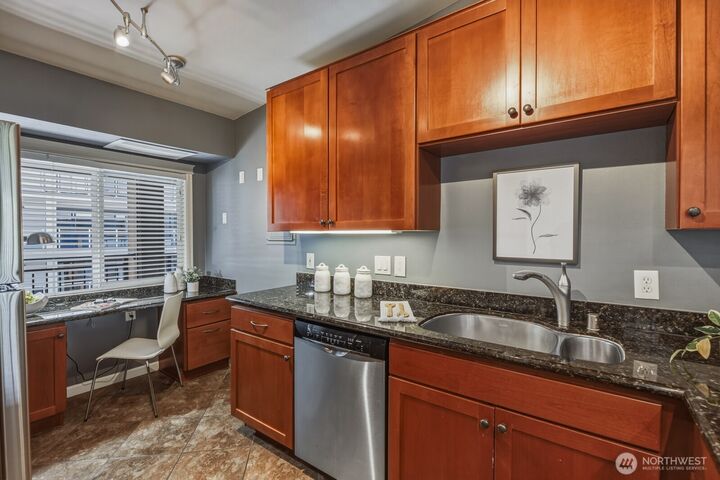 Property Photo:  130  105th Avenue SE 316  WA 98004 
