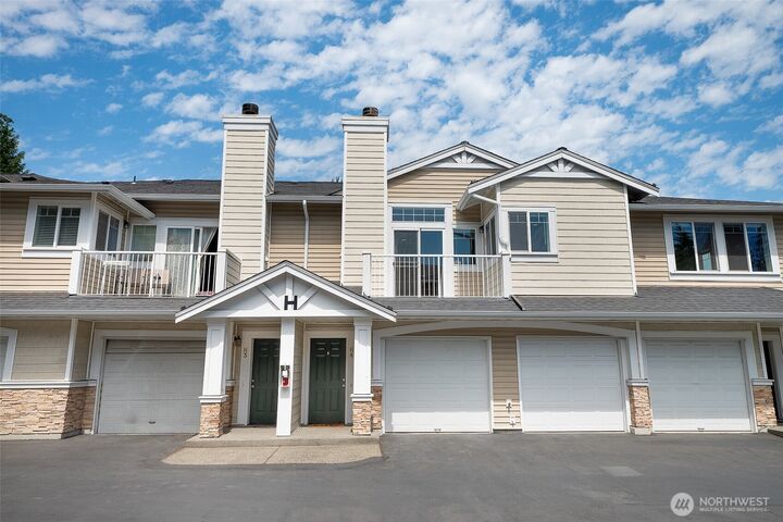 Property Photo:  6515  134th Place SE H4  WA 98296 