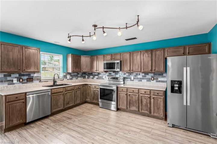 Property Photo:  4555 Ramseur Drive  NC 27101 