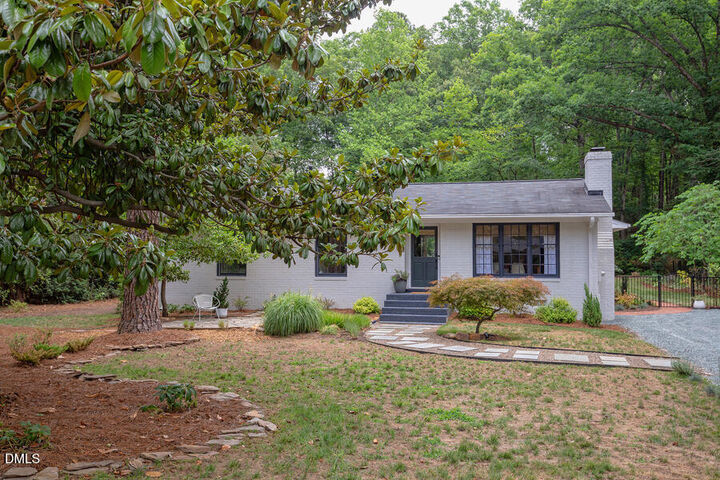 Property Photo:  809 Tinkerbell Road  NC 27517 