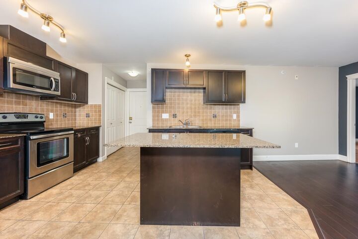 Property Photo: 12088 75A Avenue 311 BC V3W 1Y4