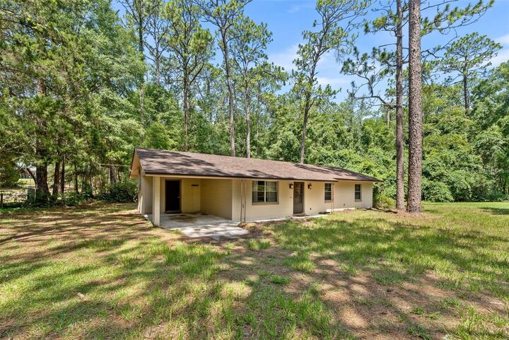 Property Photo:  22897 County Road 137  FL 32024 