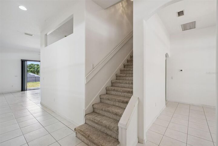 Property Photo: 13048 Baybrook Lane FL 34711