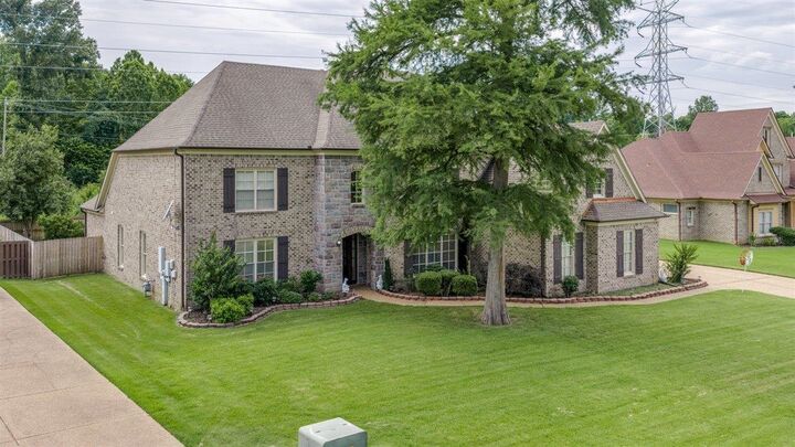 Property Photo:  1045 Woodldand Glade Cv N  TN 38018 