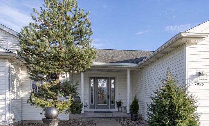 Property Photo:  7058 Shady Knoll Drive SE  MI 49316 