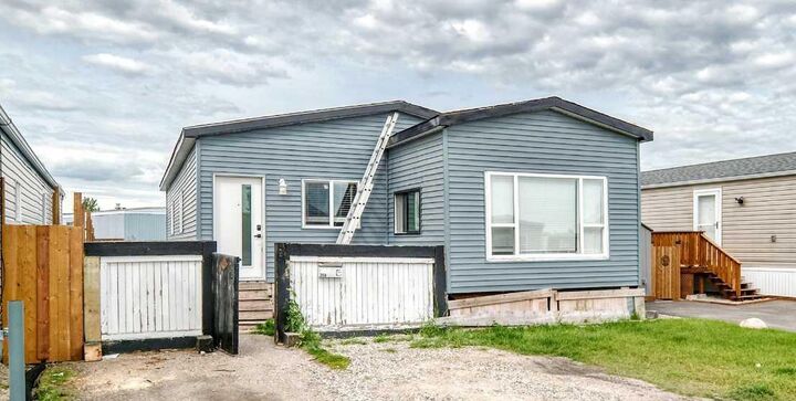 Property Photo:  6220 17 Avenue SE 356  AB T2A 7H4 