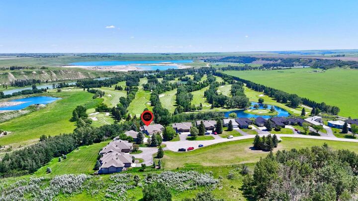 Property Photo: 44 Cottonwood Boulevard AB T1S 4W2