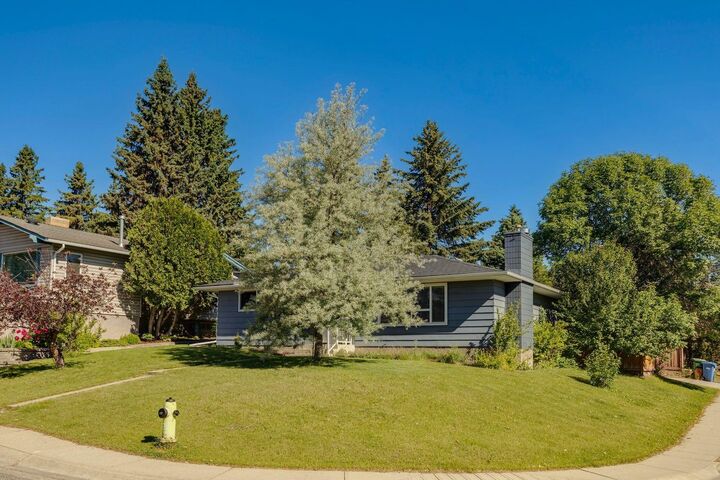 Property Photo:  716 Cantree Road SW  AB T2W 2L5 