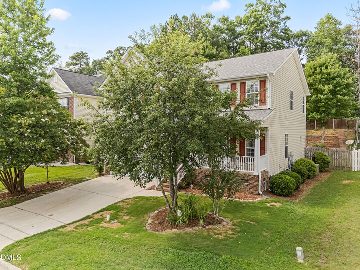 Property Photo: 1128 Woodlands Creek Way NC 27502