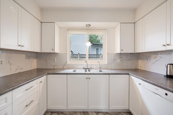 Property Photo:  12946 66A Avenue  BC V3W 8Z7 