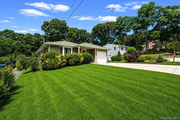 Property Photo:  390 Blue Point Road  NY 11738 