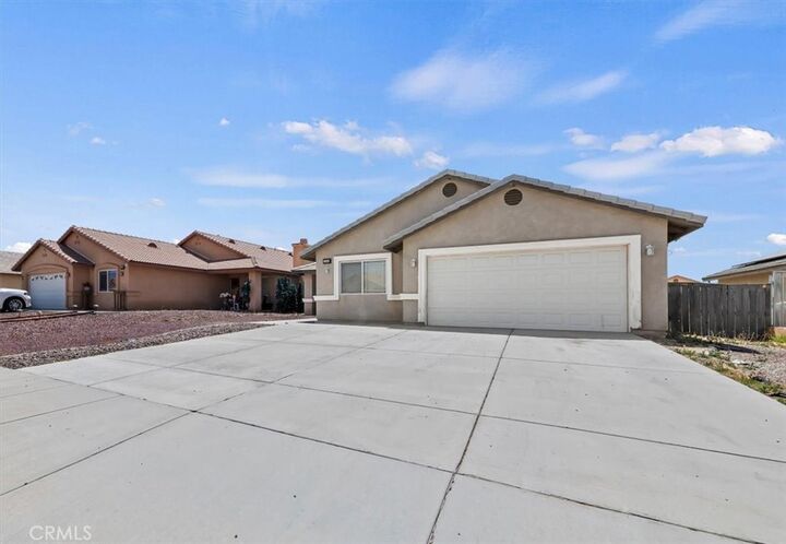 Property Photo:  14336 Caroline  CA 92301 