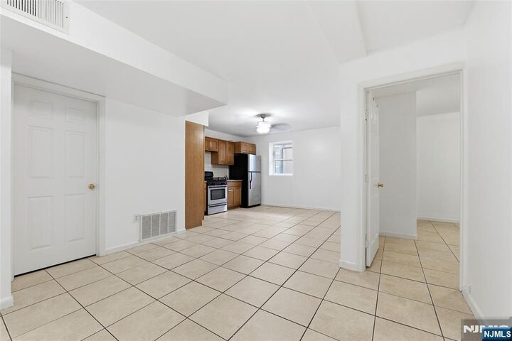Property Photo:  126-128 N 9th Ground  NJ 07522 