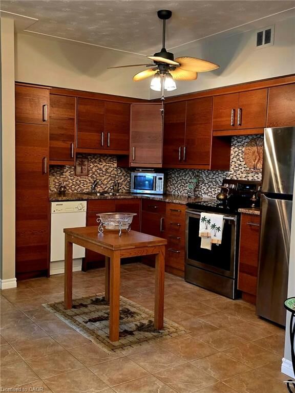 Property Photo: 10 Woodman Drive S 108 ON L8K 4E1