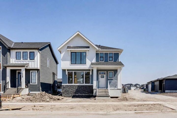 Property Photo: 202 Harmony Circle AB T3Z 0K9