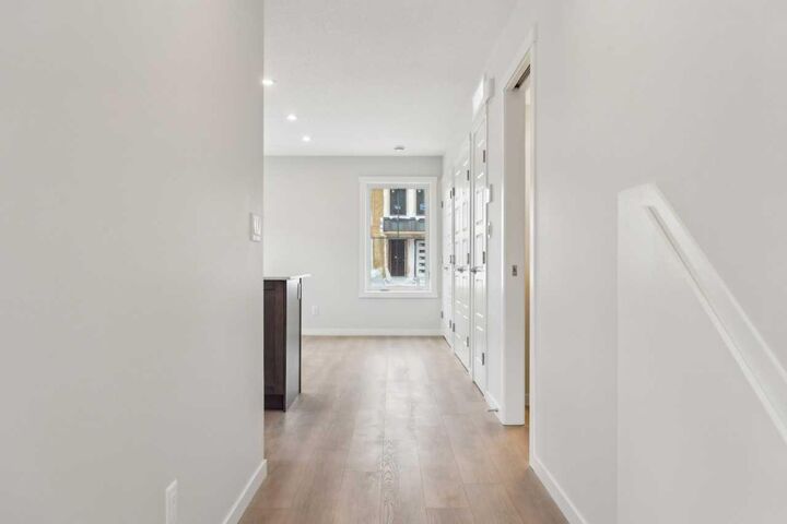 Property Photo:  63 Belmont Passage SW 101  AB T2X 4H7 
