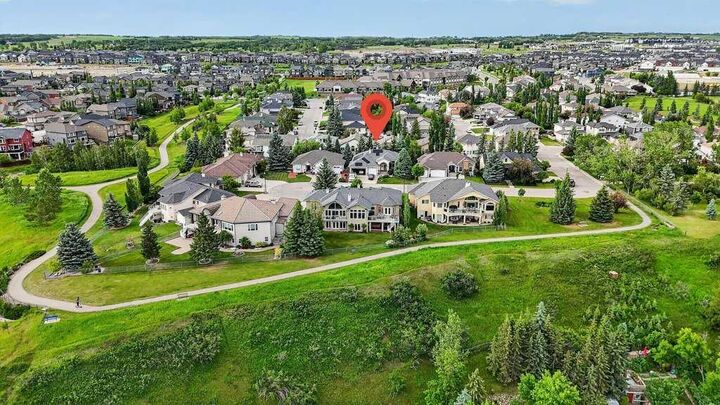 Property Photo: 52 Sandstone Ridge Crescent AB T1S 1P9