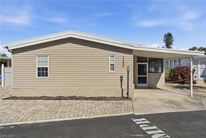 Property Photo:  24850 Windward Blvd  FL 34134 