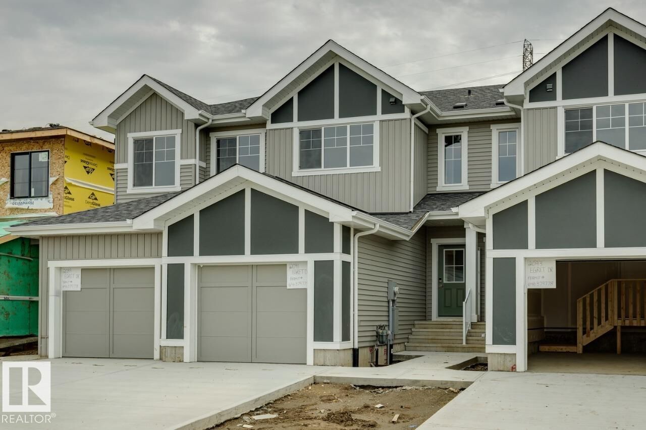Property Photo: 2091 Egret Drive NW AB T6M 3G7