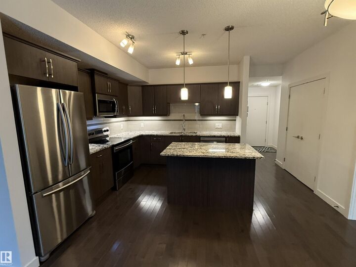 Property Photo:  10523 123 Street NW 119  AB T5N 1N9 