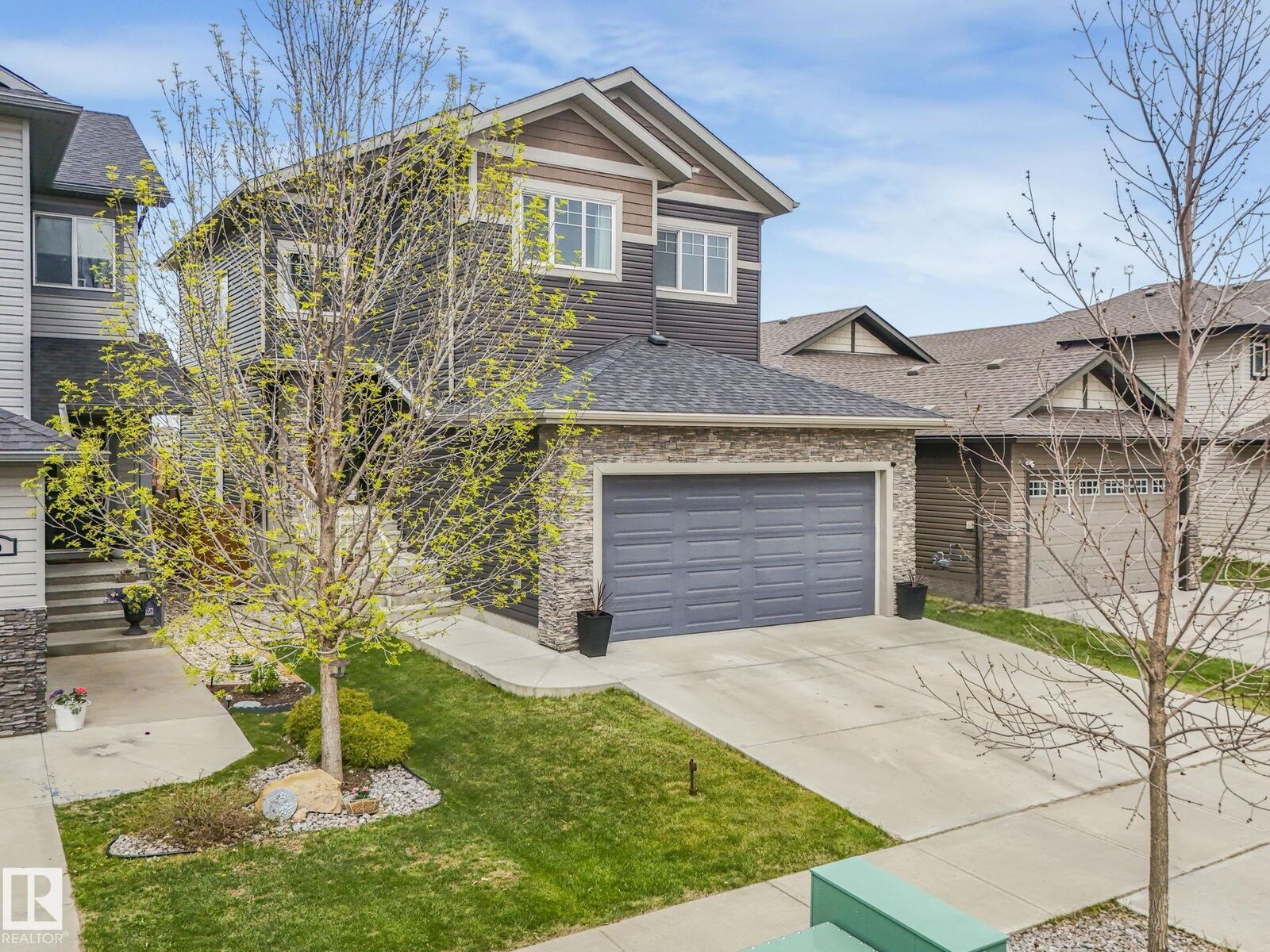 Property Photo: 12 Sandalwood Place AB T9E 1C2