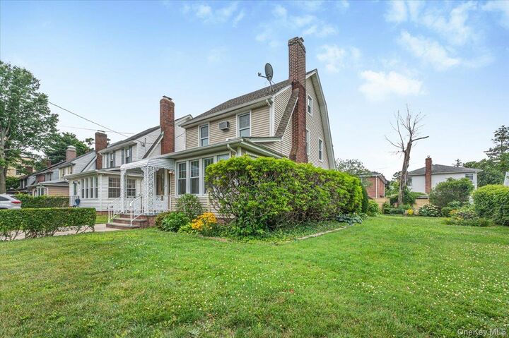 Property Photo:  251-47 42nd Avenue  NY 11363 