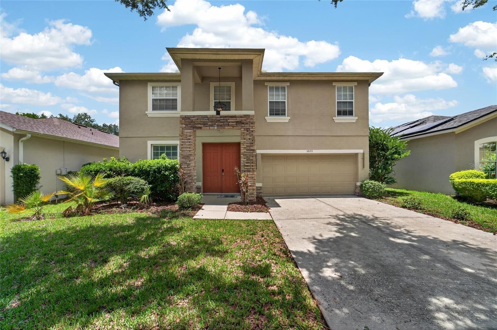 Property Photo: 19128 Meadow Pine Drive FL 33647